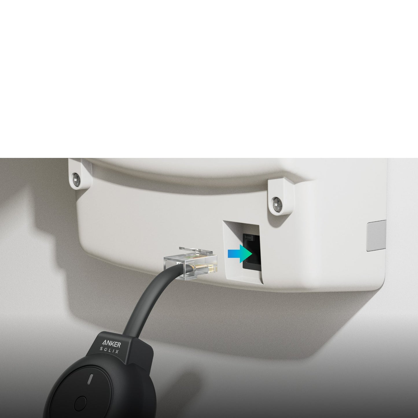 Cable being plugged into a wall socket with a close-up of the cable label.